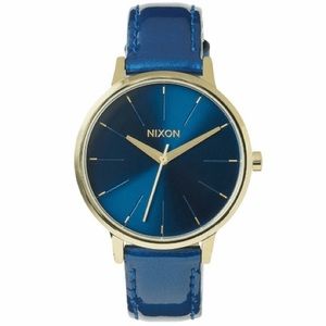Nixon watch blue patent leather strap, gold face